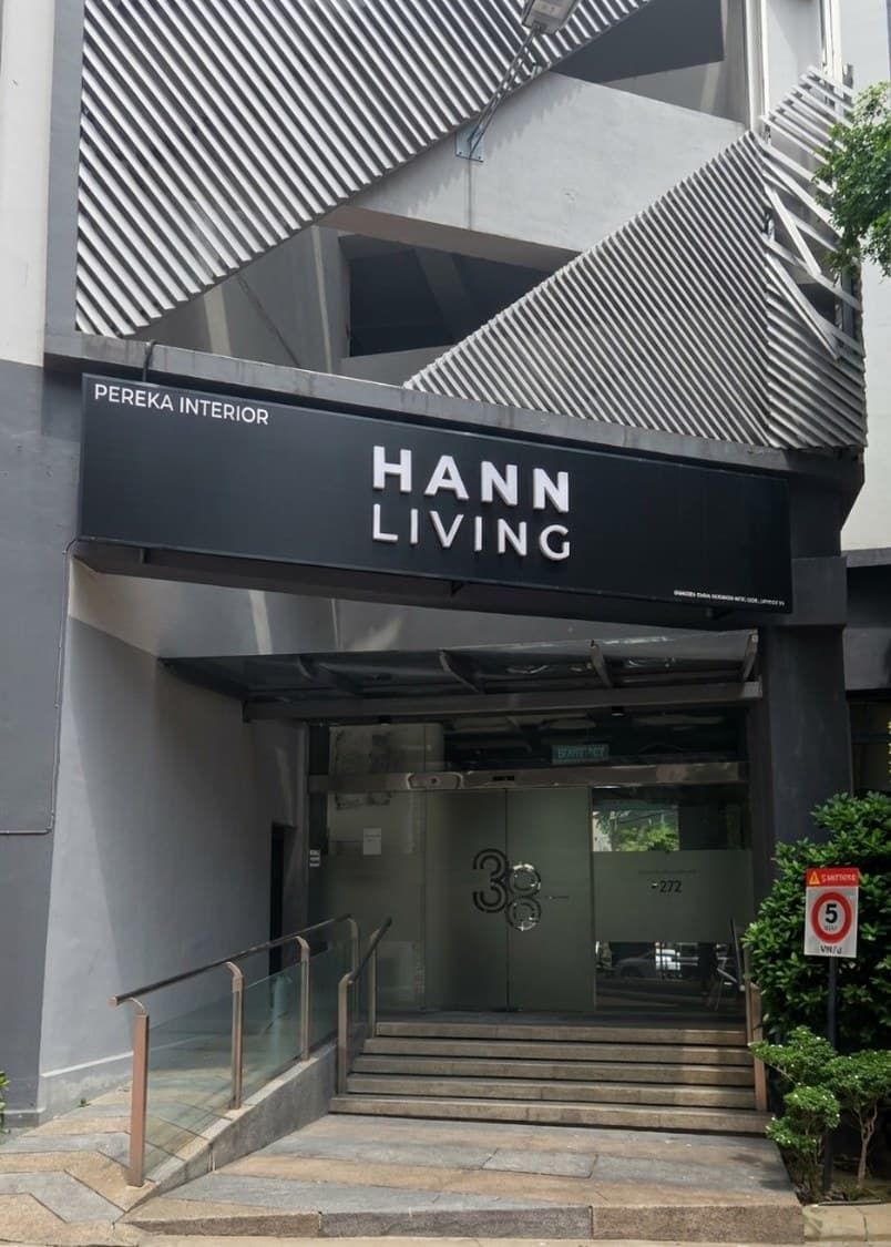 Hann Living showroom entrance with branded signage